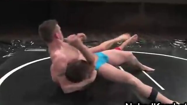 Two gays wrestling and fucking in mud