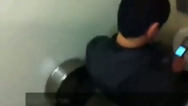 Cute Asian jerking off in the men's room