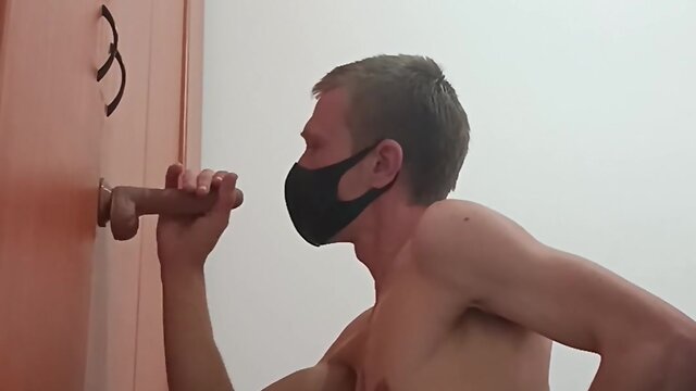 Blonde boy with dildo and mask